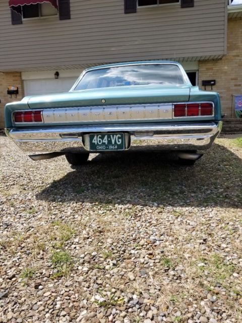1964 Teal blue Oldsmobile Cutlass Sedan