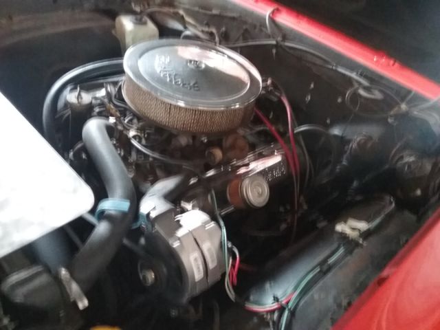 1964 Bright red Oldsmobile Cutlass