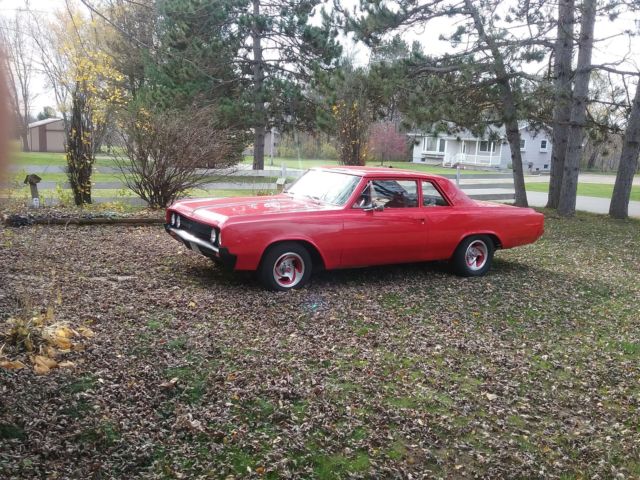 1964 Bright red Oldsmobile Cutlass