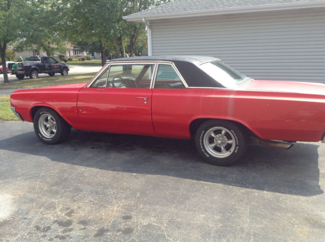 1964 Red Oldsmobile Cutlass 2 door