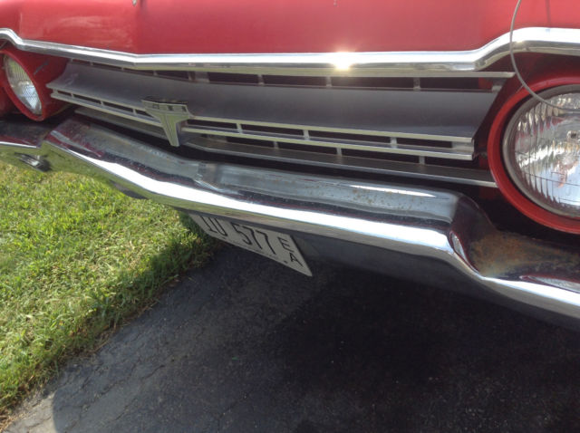 1964 Red Oldsmobile Cutlass 2 door