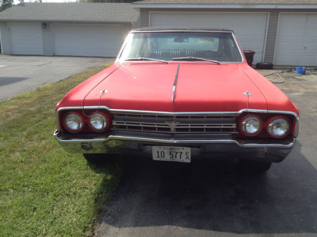 1964 Red Oldsmobile Cutlass 2 door