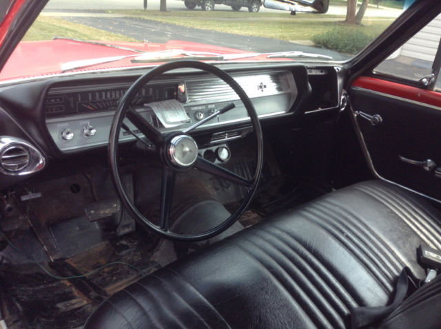 1964 Red Oldsmobile Cutlass 2 door