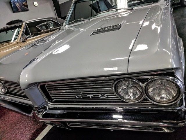 1964 Silver Pontiac GTO Sedan