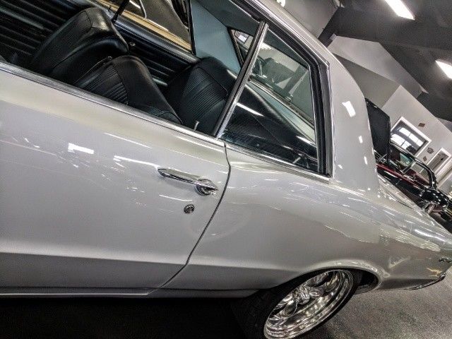 1964 Silver Pontiac GTO Sedan