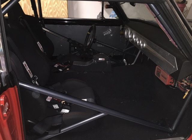 1964 red/black Chevrolet Nova 2D