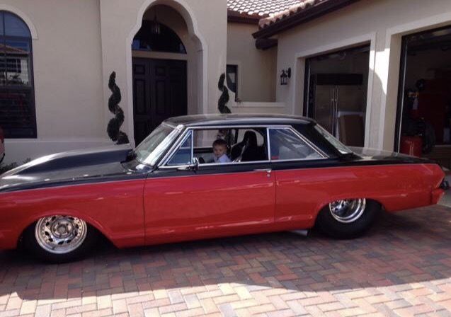 1964 red/black Chevrolet Nova 2D