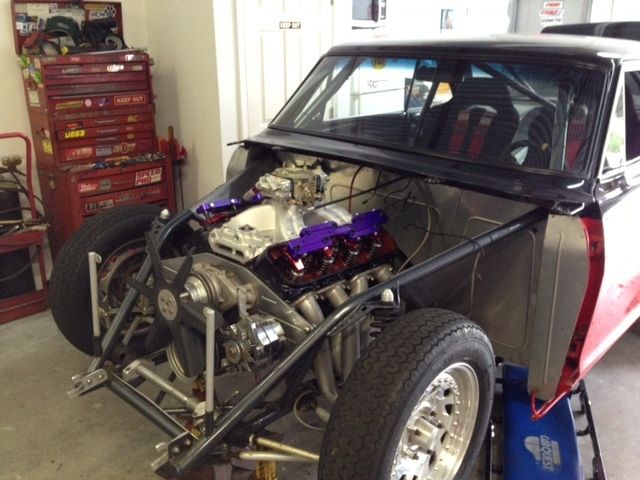 1964 red/black Chevrolet Nova 2D