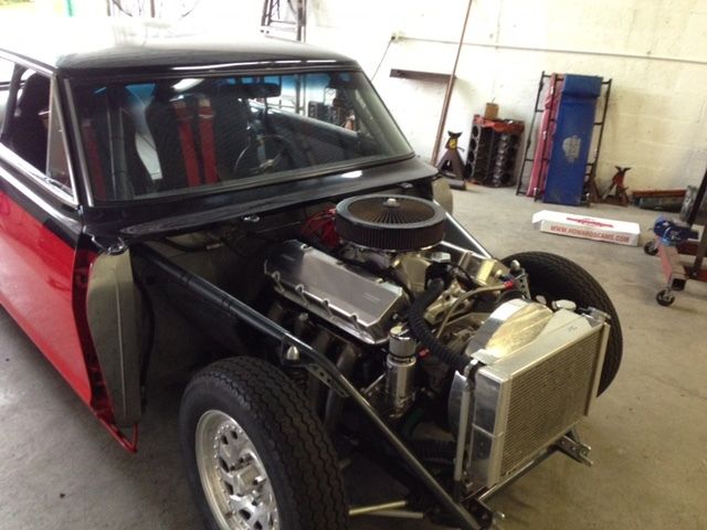 1964 red/black Chevrolet Nova 2D