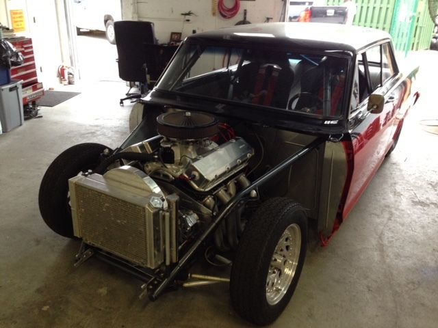 1964 red/black Chevrolet Nova 2D