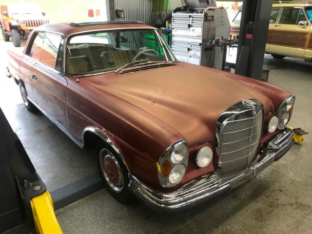 1964 Red Mercedes-Benz 200-Series Coupe
