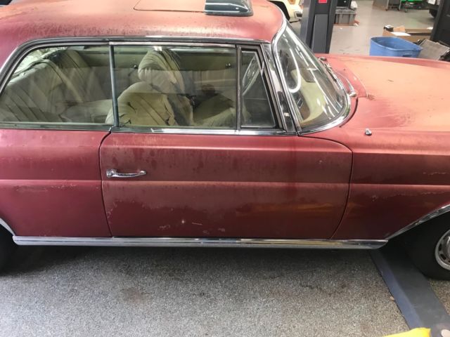 1964 Red Mercedes-Benz 200-Series Coupe