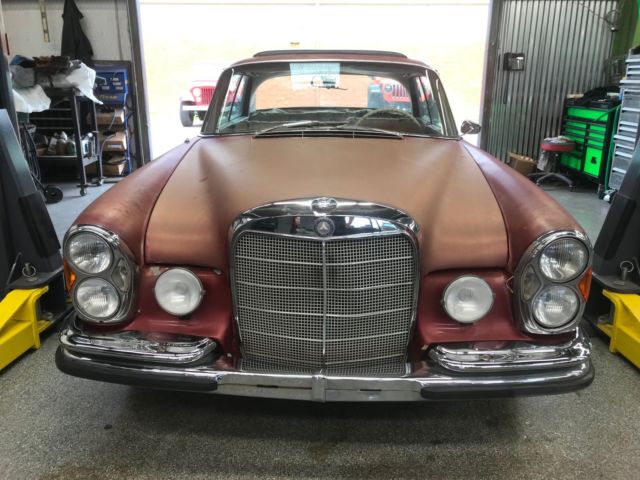 1964 Red Mercedes-Benz 200-Series Coupe
