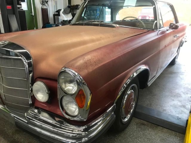 1964 Red Mercedes-Benz 200-Series Coupe