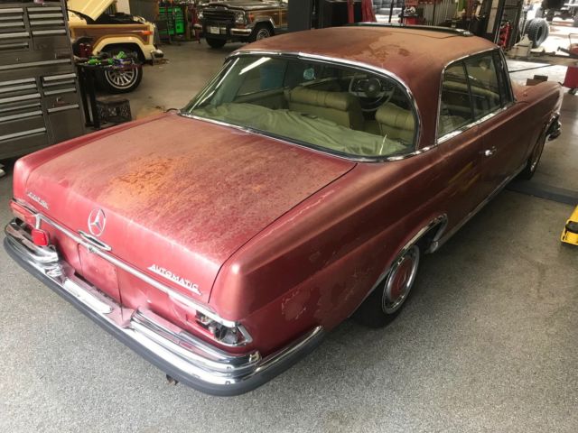 1964 Red Mercedes-Benz 200-Series Coupe