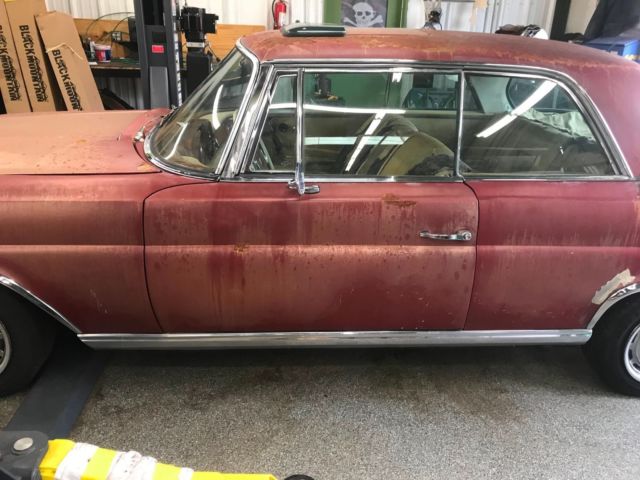 1964 Red Mercedes-Benz 200-Series Coupe