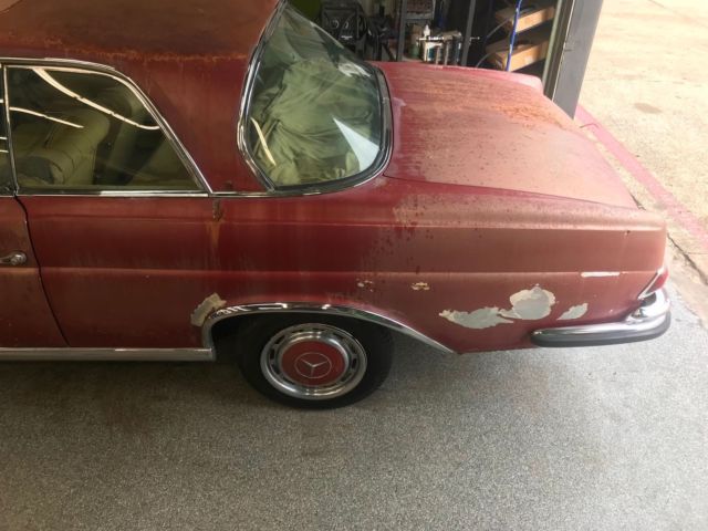 1964 Red Mercedes-Benz 200-Series Coupe