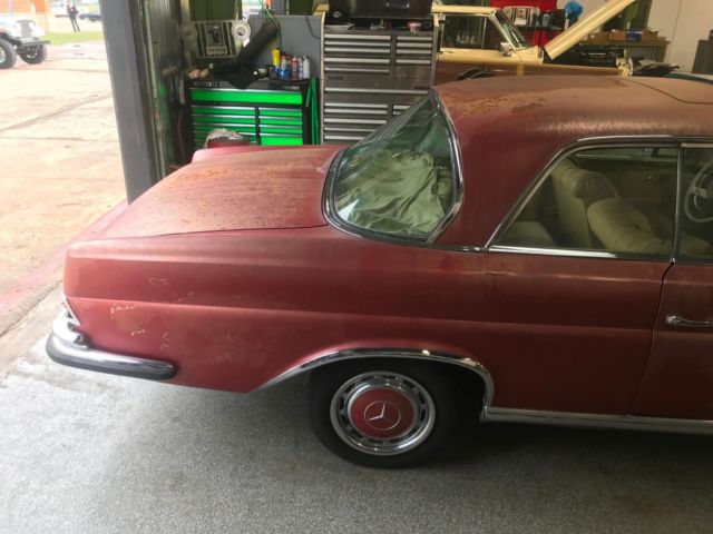 1964 Red Mercedes-Benz 200-Series Coupe