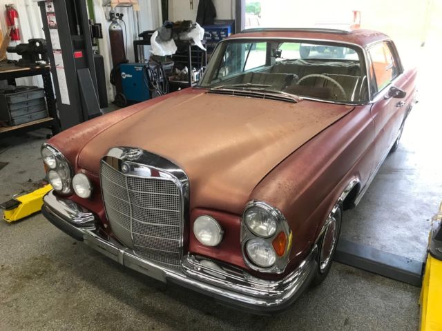 1964 Red Mercedes-Benz 200-Series Coupe