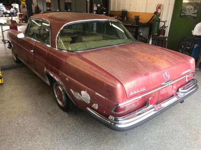 1964 Red Mercedes-Benz 200-Series Coupe