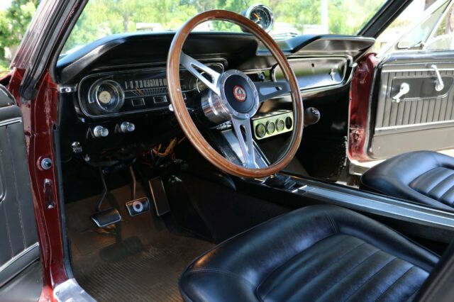 1965 Burgundy Ford Mustang Fastback