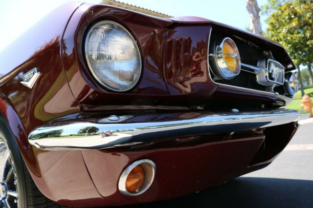 1965 Burgundy Ford Mustang Fastback