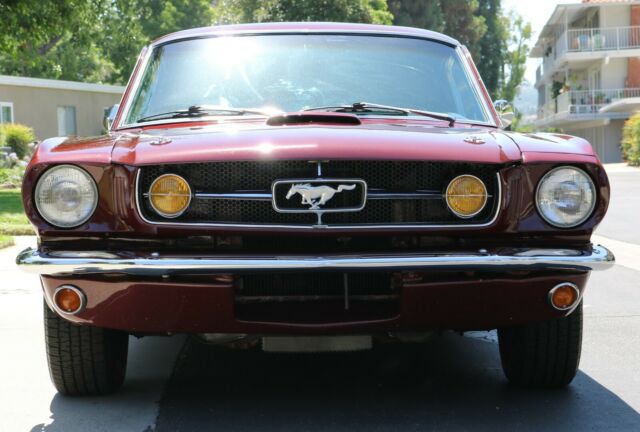 1965 Burgundy Ford Mustang Fastback