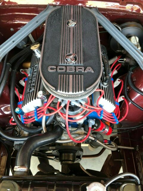 1965 Burgundy Ford Mustang Fastback