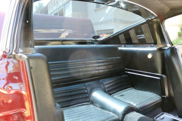 1965 Burgundy Ford Mustang Fastback