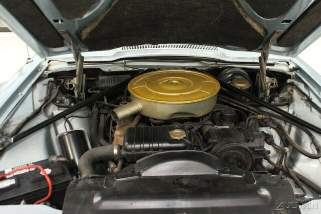 1965 Gold Ford Thunderbird