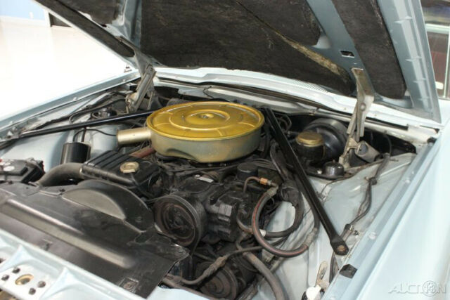 1965 Gold Ford Thunderbird