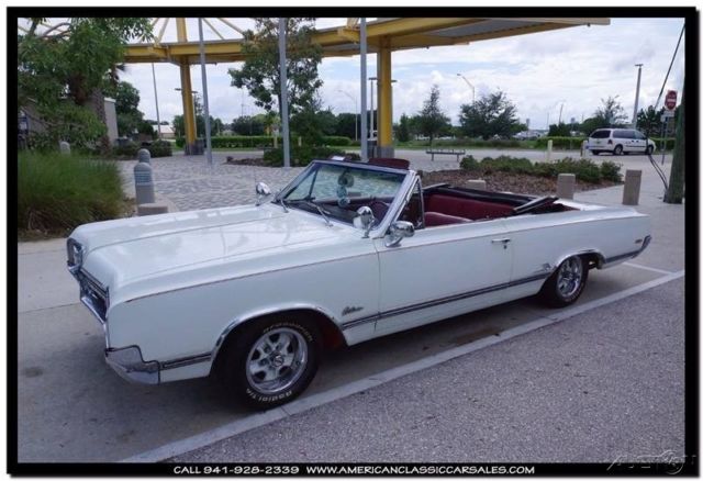 1965 White Oldsmobile Cutlass