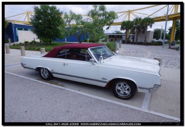 1965 White Oldsmobile Cutlass