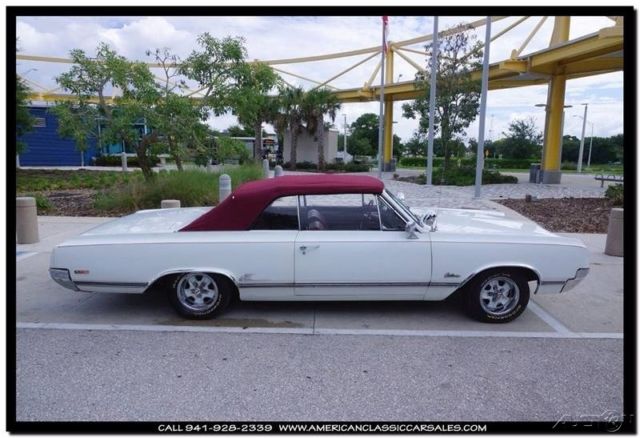 1965 White Oldsmobile Cutlass