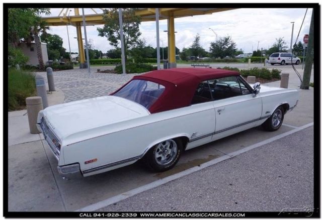 1965 White Oldsmobile Cutlass