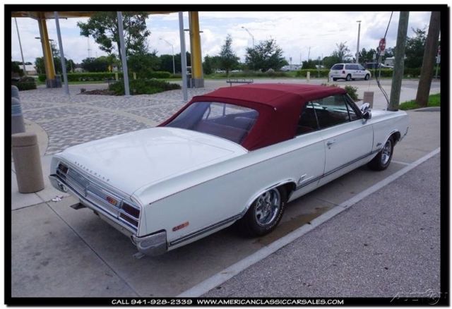 1965 White Oldsmobile Cutlass