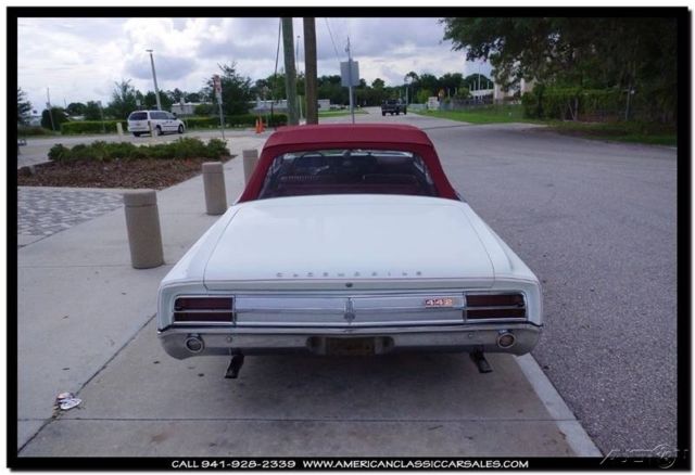 1965 White Oldsmobile Cutlass