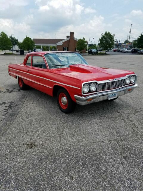 1965 Red Chevrolet Bel Air/150/210 Sedan