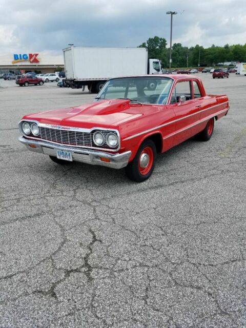 1965 Red Chevrolet Bel Air/150/210 Sedan