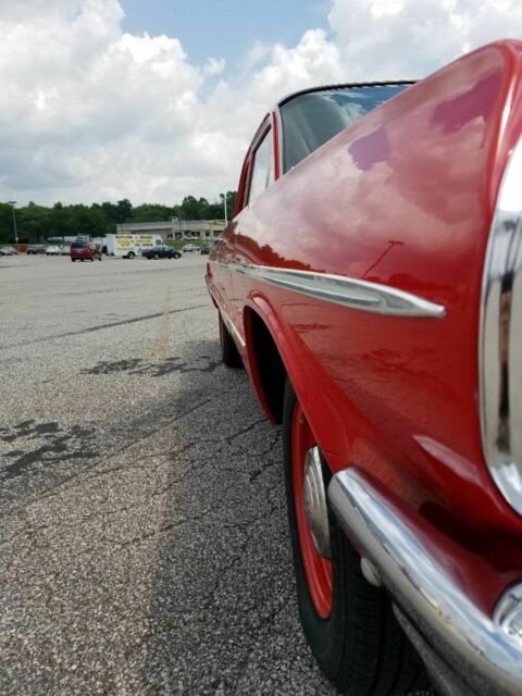 1965 Red Chevrolet Bel Air/150/210 Sedan
