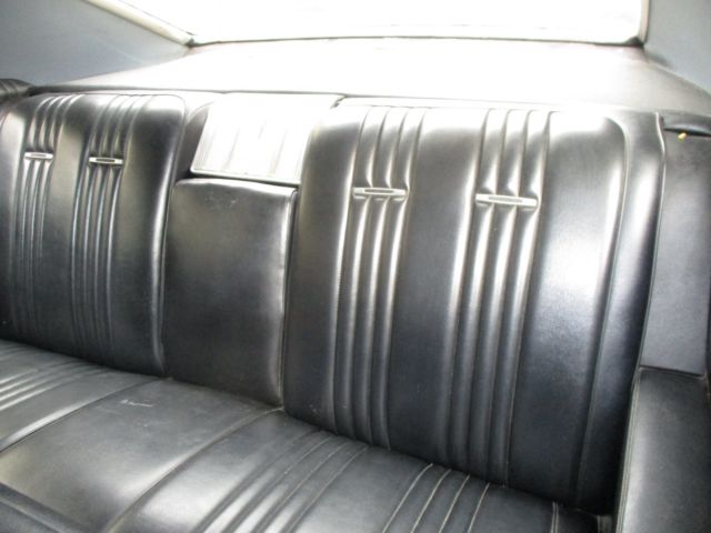 1965 Yellow Pontiac Bonneville hardtop