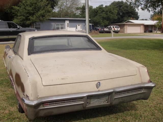 1965 tan Buick Riviera Coupe