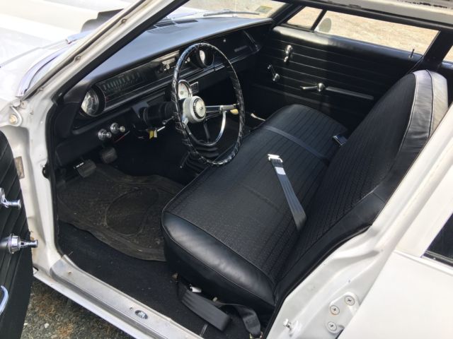 1965 White Chevrolet Impala Wagon