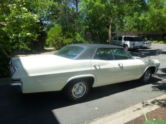 1965 White Chevrolet Capriceold Sedan