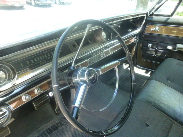 1965 White Chevrolet Capriceold Sedan