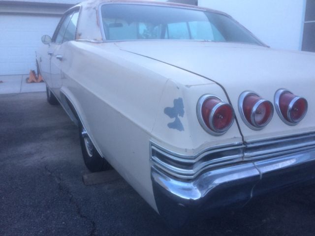 1965 Tan Chevrolet Capriceold 4 dr. Hardtop.