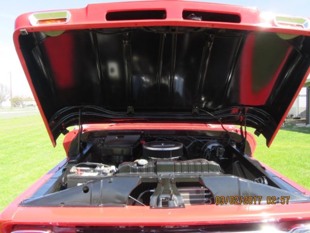 1965 Red and White Chevrolet Suburban Suburban