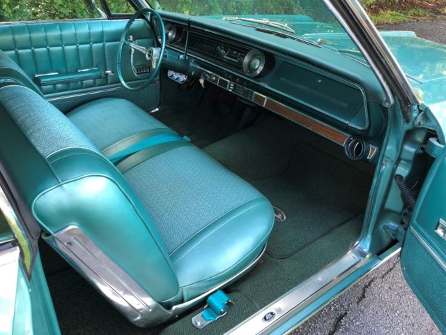 1965 Teal Chevrolet Impala Coupe