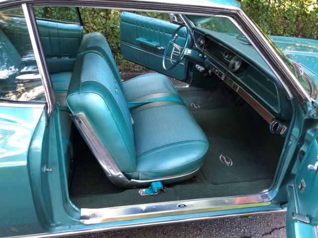 1965 Teal Chevrolet Impala Coupe