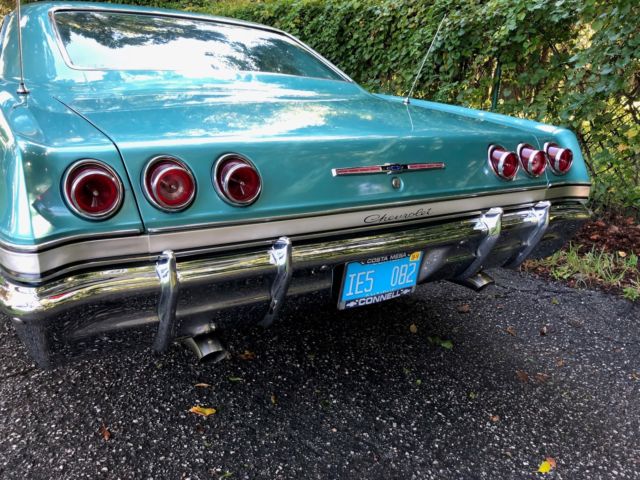 1965 Teal Chevrolet Impala Coupe